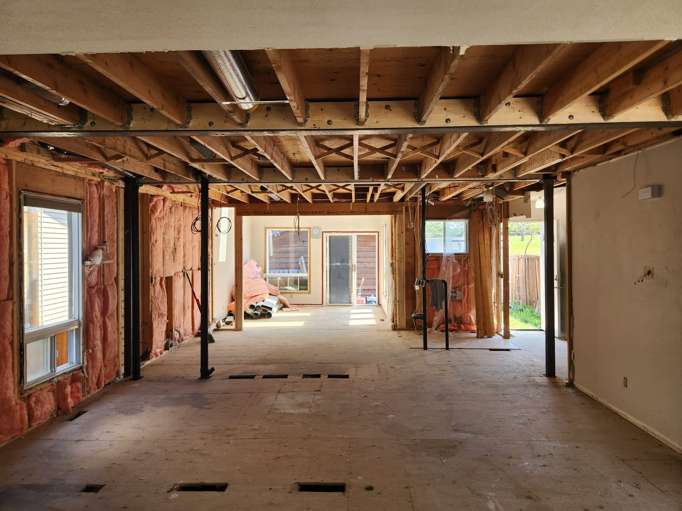 Open main floor after the bearing wall came out, carried on a new beam