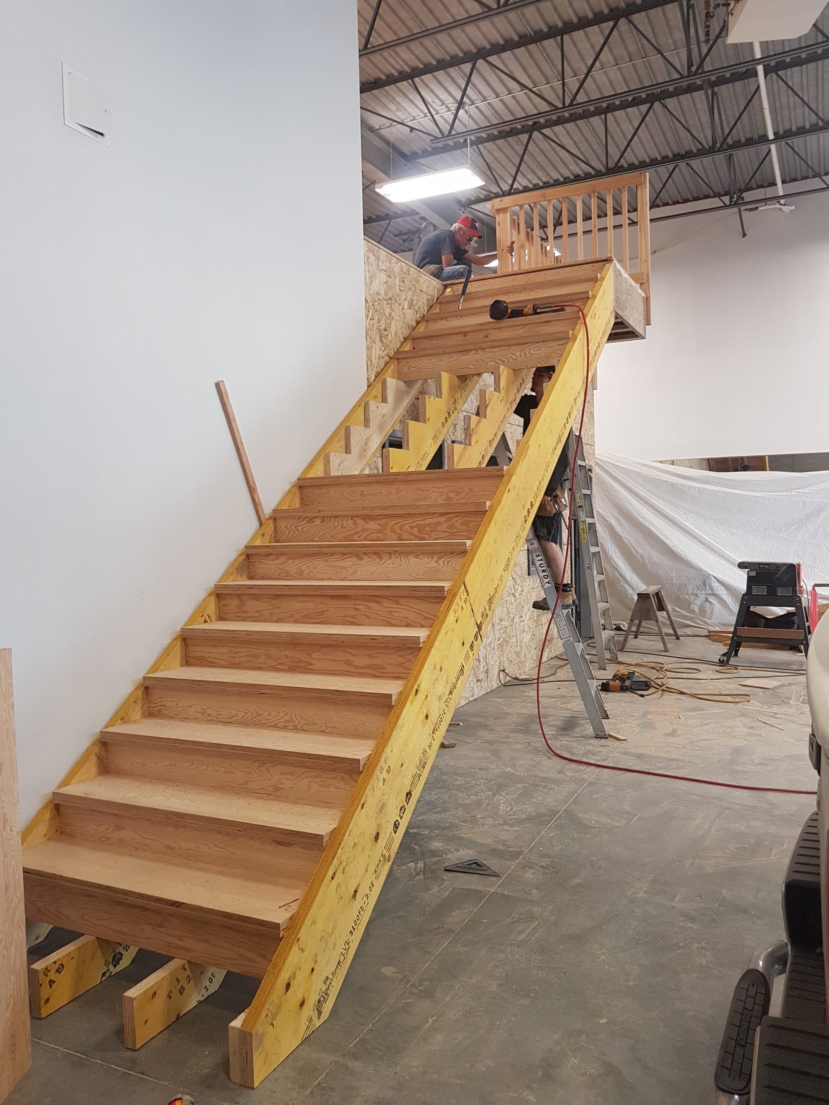 Wood stair framing built into a commercial space